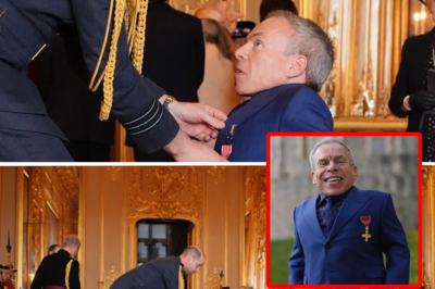Prince William kneels to share a joke while honoring star Warwick Davis